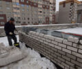Стены новой школы в 4-м микрорайоне Брянска практически готовы